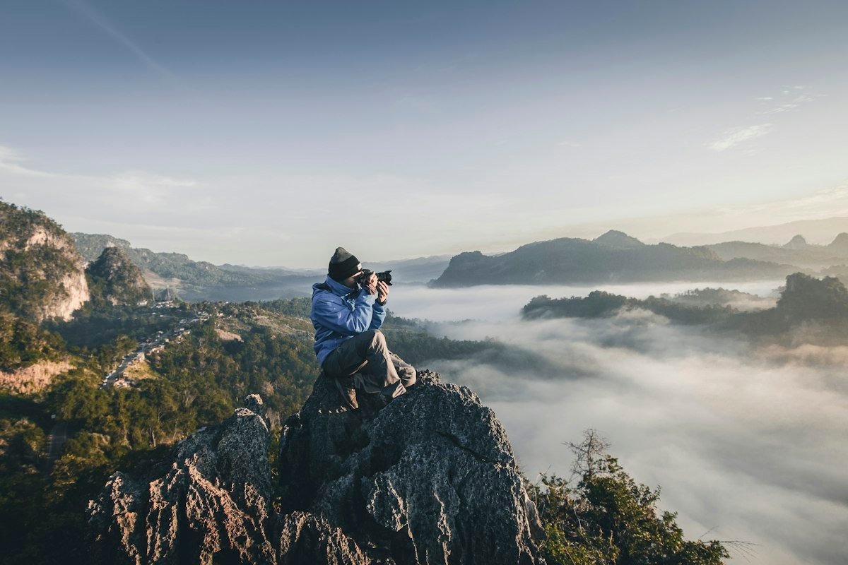 Content creator filming with a camera